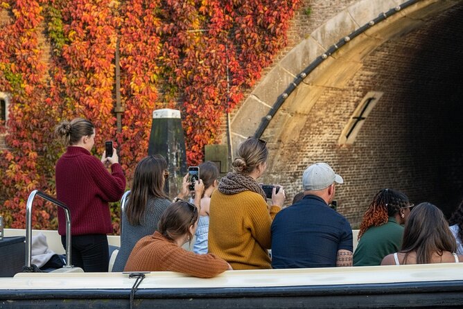Amsterdam 1-Hour Canal Cruise With Live Guide - Churches, towers, theatres, and markets: the Amsterdam details you’d miss otherwise