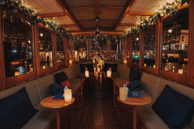 Amsterdam: 2-Hour Canal Cruise incl. Drinks & Dutch Snacks - Big Amsterdam landmarks from the water: bridges, theaters, and churches