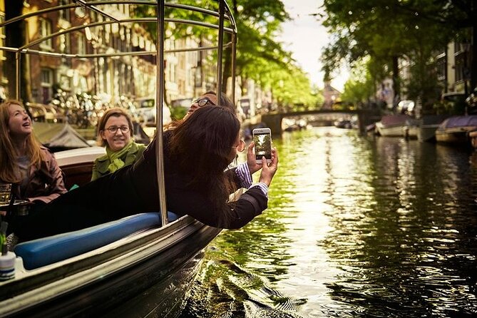 Amsterdam 2-hour Private Canal Cruise with Live Guide and Drinks - Why a private 2-hour canal cruise feels like Amsterdam