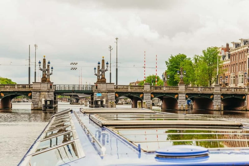 Amsterdam: 75 Minute City Canal Cruise with Audio Guide - Snack box option: a small comfort upgrade