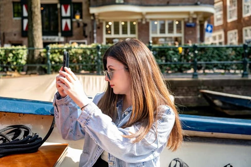 Amsterdam: 75 minute Open Boat Canal Cruise with Live Guide - What You’re Really Buying With a $22 Ticket
