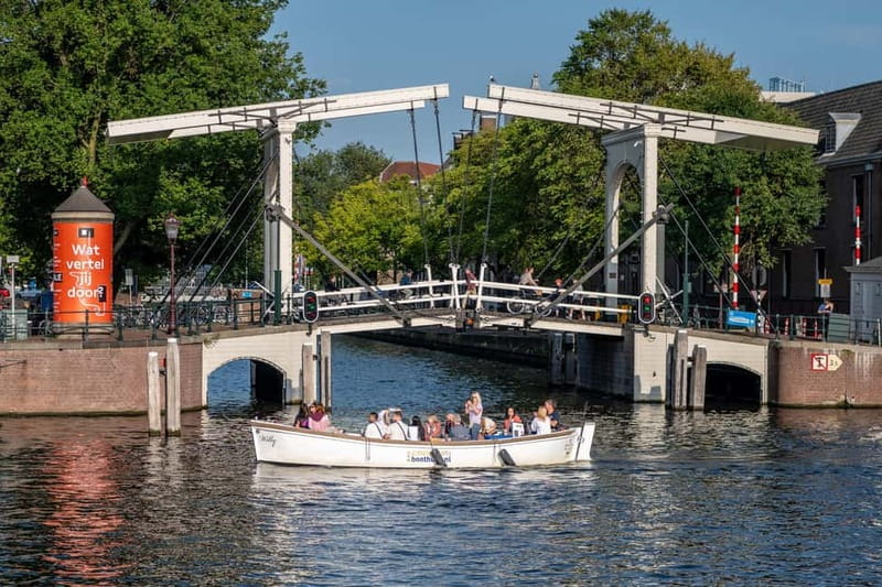 Amsterdam: 75 minute Open Boat Canal Cruise with Live Guide - Best Time to Go (and How to Dress for the Water)