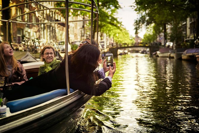 Amsterdam 90-min Private Canal Cruise with Live Guide and Drinks - Key highlights you’ll actually feel