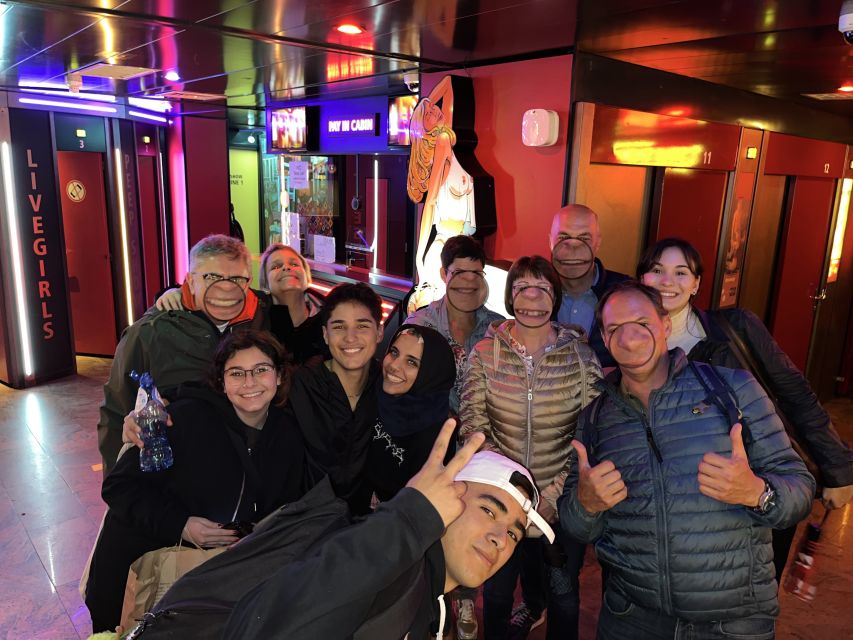 Amsterdam: After Dark Red Light District Tour - Hidden gem viewpoint moments: cobblestones, micro-stops, and a torture chamber detour