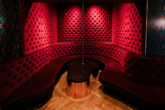 Amsterdam: Behind the Scenes Strip Club Tour with Ex-Sex Worker - The candid Q&A: history, legal prostitution, and day-to-day realities