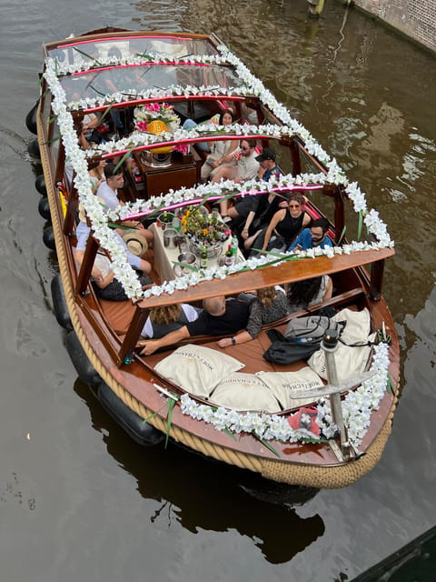 Amsterdam: Boat Tour with Optional Unlimited Drinks - Enterprise Boat Style: Open Air Views Plus a Disco Mood