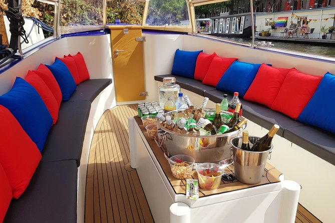 Amsterdam: Canal Booze Cruise with Unlimited Drinks Option - One-hour cruise that combines showy sights and a social bar