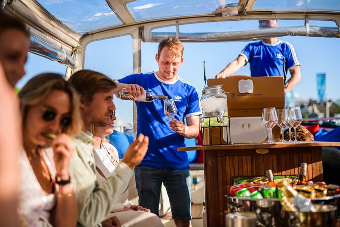 Amsterdam: Canal Booze Cruise with Unlimited Drinks Option - Price and value: what $26 gets you on the water