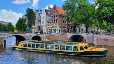 Amsterdam: Canal Cruise from Anne Frank Museum - The boat setup: heated comfort, toilet, and a photo deck that actually helps