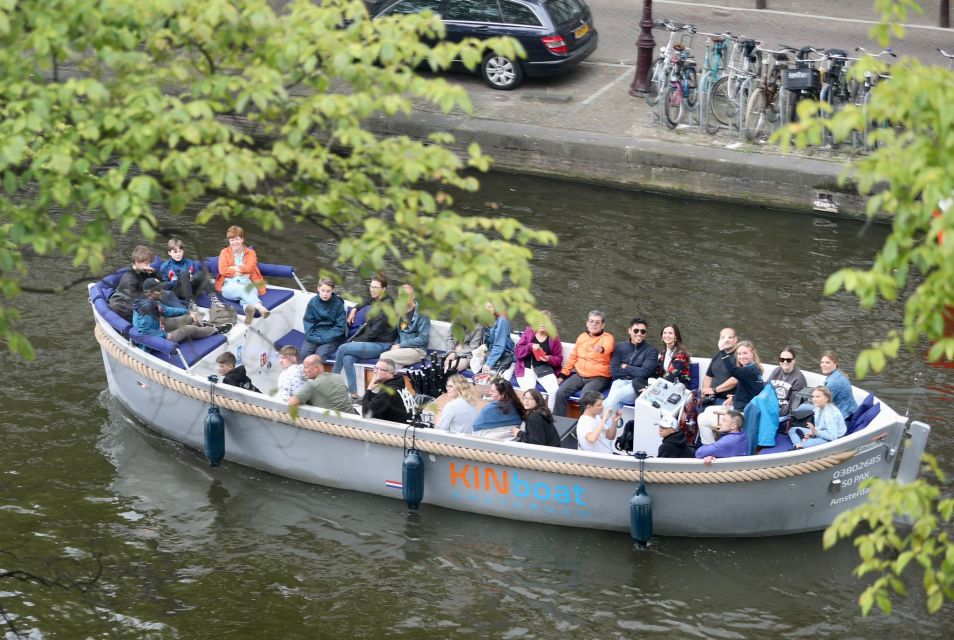 Amsterdam: Canal Cruise in Open Boat with Drink Option - Open boat reality check: weather, photos, and comfort