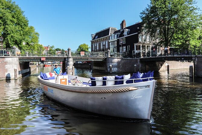 Amsterdam Canal Cruise in Open Boat with Unlimited Drinks Option - Passing the Hermitage Museum: a smart landmark to remember