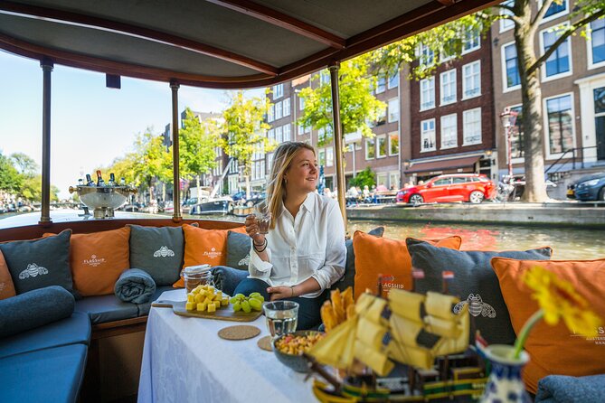 Amsterdam Canal Cruise with Cheese and Wine - The Guide Matters: Humor, Q&A, and Varying Personalities