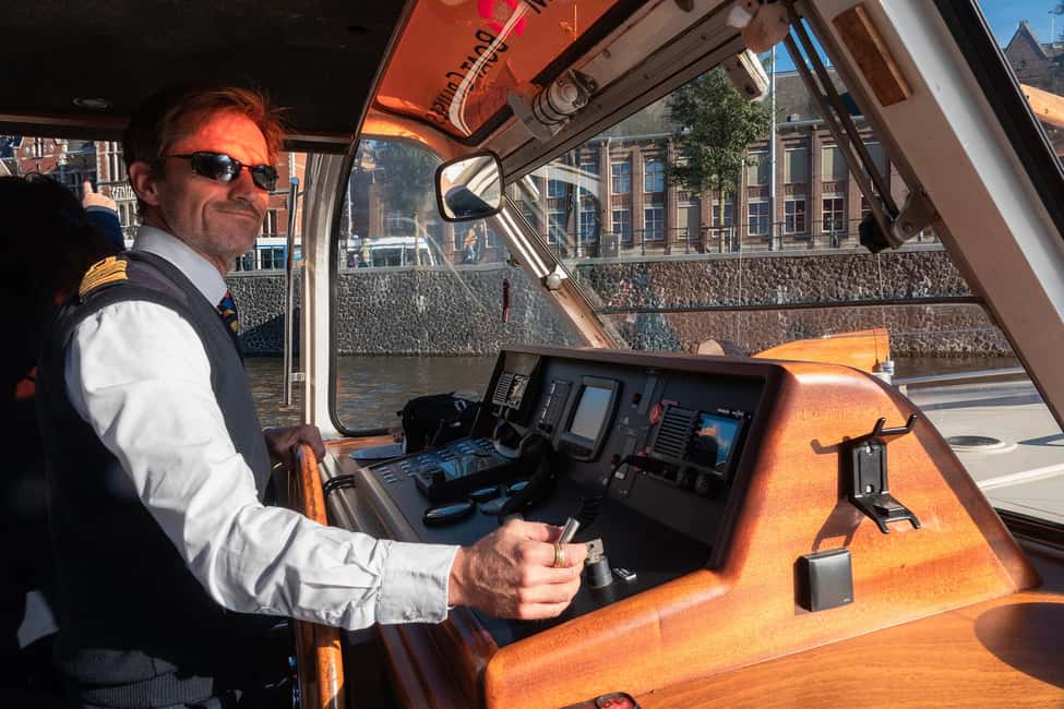 Amsterdam: Canal Cruise with Live Commentary & Audio Guide - Live captain commentary plus multilingual audio: the best way to listen