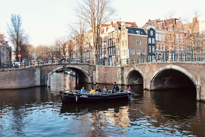 Amsterdam Canal Tour by Open Boat – 90 min Small Group Experience - Best time to go (and what weather really changes)