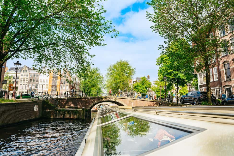 Amsterdam: City Canal Cruise and Rijksmuseum - Snack, audio, and comfort details that add up