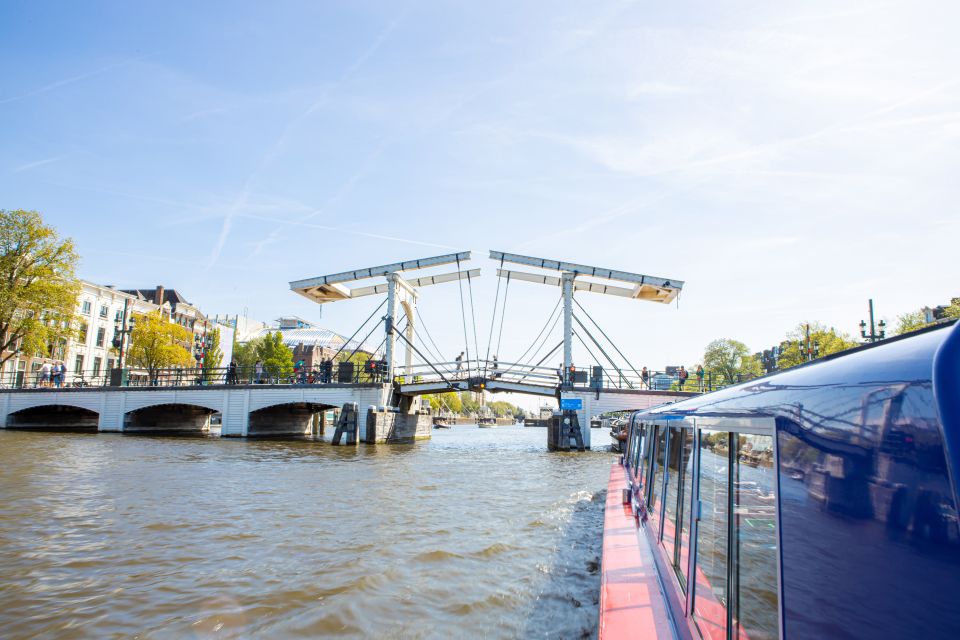 Amsterdam: City Canal Cruise and Rijksmuseum - The 75-minute UNESCO canal cruise: views, audio, and minimal fuss