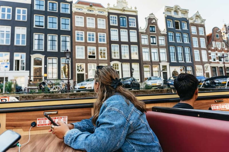 Amsterdam: City Centre Canal Cruise & Free Flower Cocktail - Onboard Comfort in Rain or Shine: Toilet, Wi‑Fi, and a Roof