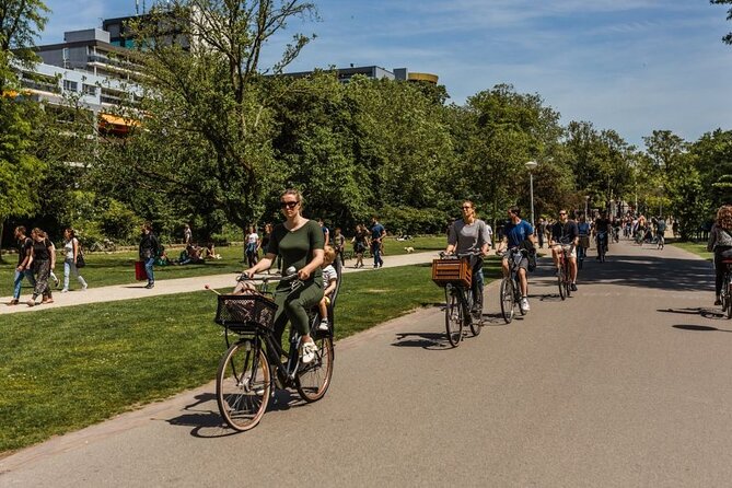 Amsterdam City Highlights and Hidden Gems - Private & Custom Tour - A relaxed central square with bookstores and tucked-away passages