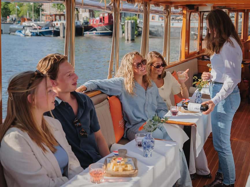 Amsterdam: Classic Boat Cruise with Optional Cheese & Wine - Before You Go: Warm Layers, 18+ Drinks, and the Boat Step