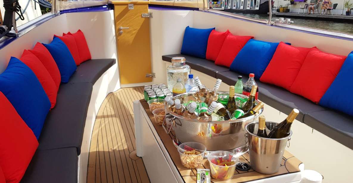 Amsterdam: Covered Canal Booze Cruise with Unlimited Drinks - The Covered Boat Setup: Blankets, No Music, and Real Conversation Time