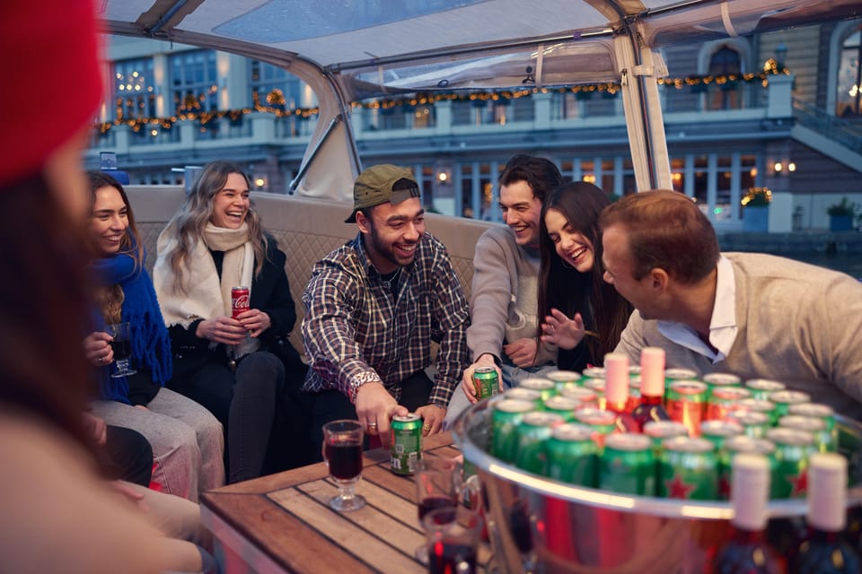 Amsterdam: Covered Canal Booze Cruise with Unlimited Drinks - Covered Comfort Meets Straightforward Amsterdam Sightseeing