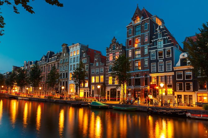 Amsterdam Evening Canal Cruise with Live Guide and Onboard Bar - Opera and theatre near the Amstel: Carré and the Stopera connection