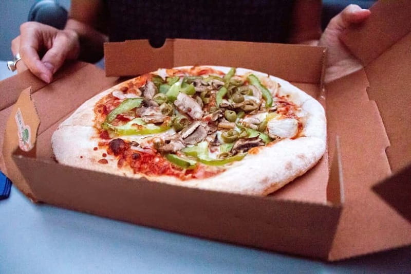 Amsterdam: Evening Pizza Cruise Along the Canals - The Heated Boat Experience: Warm, Practical, and Easy to Settle In