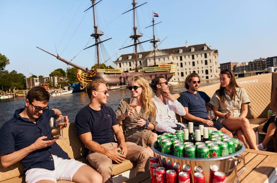 Amsterdam: German Guided Canal Cruise with on Board Bar - From Basilica and Maritime Museum to Rembrandthuis and the Canal Power Stretch