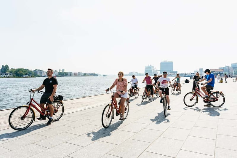 Amsterdam: Guided Bike Tour City Centre in EN/DE/FR/ES - Leidseplein to Vondelpark: Street Energy, Then a Real Break