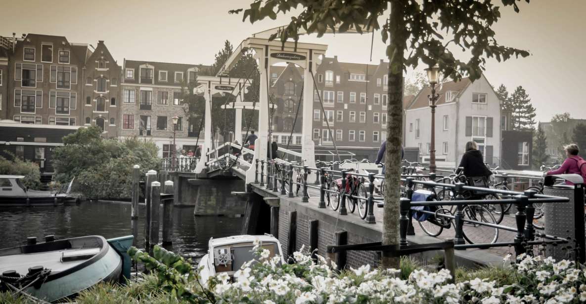 Amsterdam: Guided City Bike Tour in French - Grachtengordel Canals and Magere Brug: The Photo Stops That Teach You