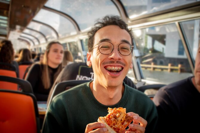 Amsterdam Guided Cruise with New York Pizza, Drinks and Ice Cream - Museums and waterfront scenes: Rijksmuseum to the floating flower market