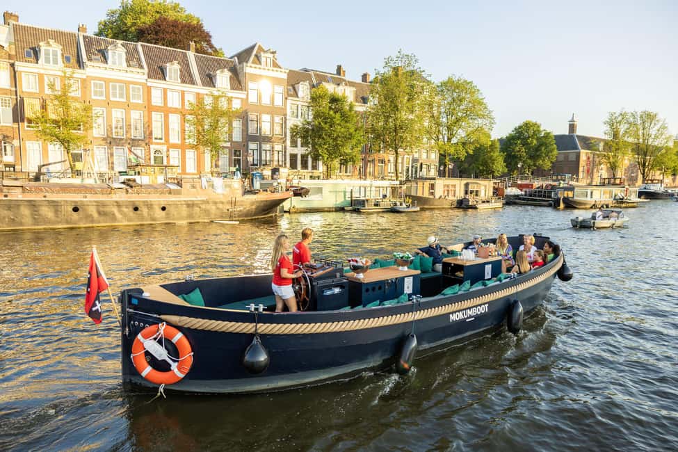 Amsterdam: Guided Open Boat Canal Cruise Including Drink - Key things I’d zero in on