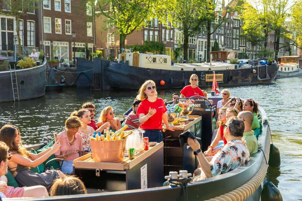 Amsterdam: Guided Open Boat Canal Cruise Including Drink - What $26 means here: value beyond just a boat ride