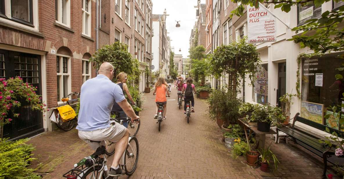 Amsterdam: Hidden Gems & Highlights Guided Bike Tour - Jordaan Backstreets: Courtyards, Churches, and Canal Ring Bridges