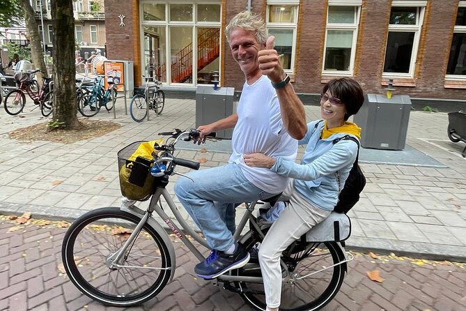 Amsterdam Highlights Bike or E-Bike Tour - Holocaust Namenmonument and Nieuwmarkt: Brief Stops With Real Weight