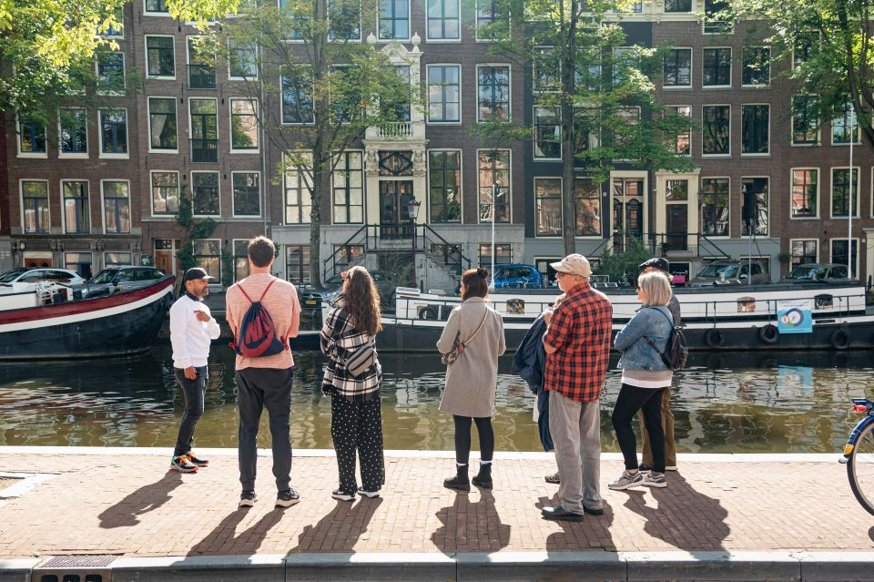 Amsterdam: Highlights & History Walking Tour - Red-Light District History Through Legalization, Not Just Sights
