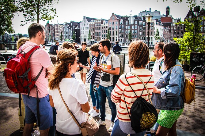 Amsterdam Highlights Small-Group Walking Tour - Entering Amsterdam’s Highlights at Beursplein (and finding your guide fast)