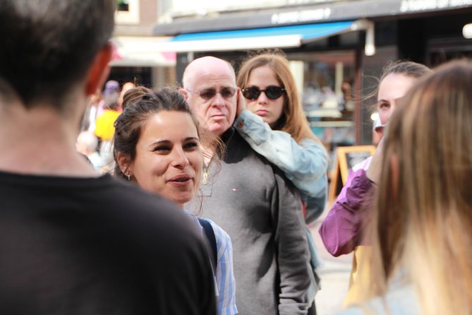 Amsterdam Highlights Small-Group Walking Tour - Dam Square finish: Royal Palace views, Nieuwekerk nearby, and the National Monument