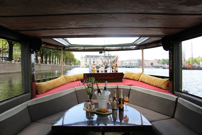 Amsterdam: Luxury Boat Cruise Unlimited Cocktails, Beers & Wines - Sightseeing from the water: why the “top sights” list matters