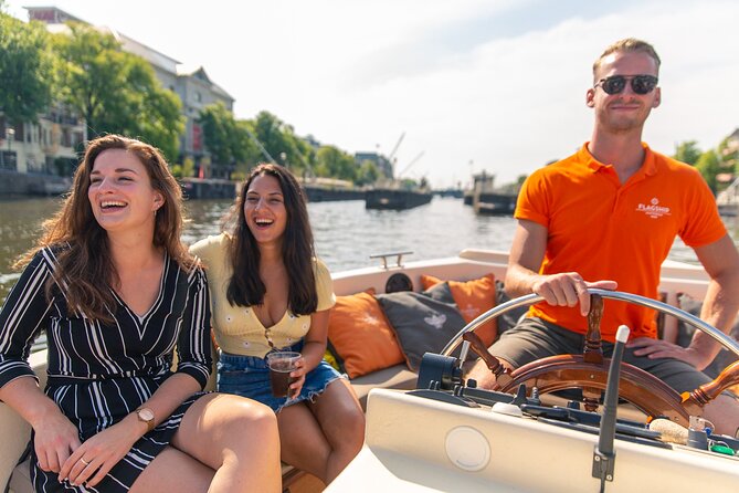 Amsterdam Luxury Canal Cruise + Unlimited Drinks & Bites option - Amstel-side sights: Carré, Magere Brug, and the Skinny Bridge moment