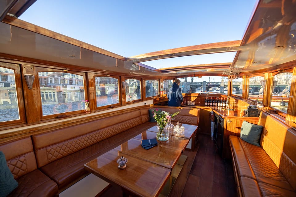 Amsterdam: Luxury Canal Cruise with Optional Snacks & Drinks - The guide and skipper combo that makes it feel personal