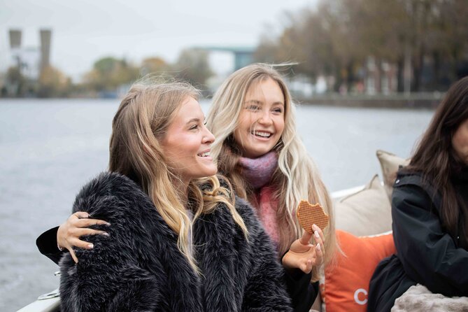 Amsterdam: Luxury Saloon Boat Cruise with Cocktails & Waffle - Cocktails and the real cost: how the bar works
