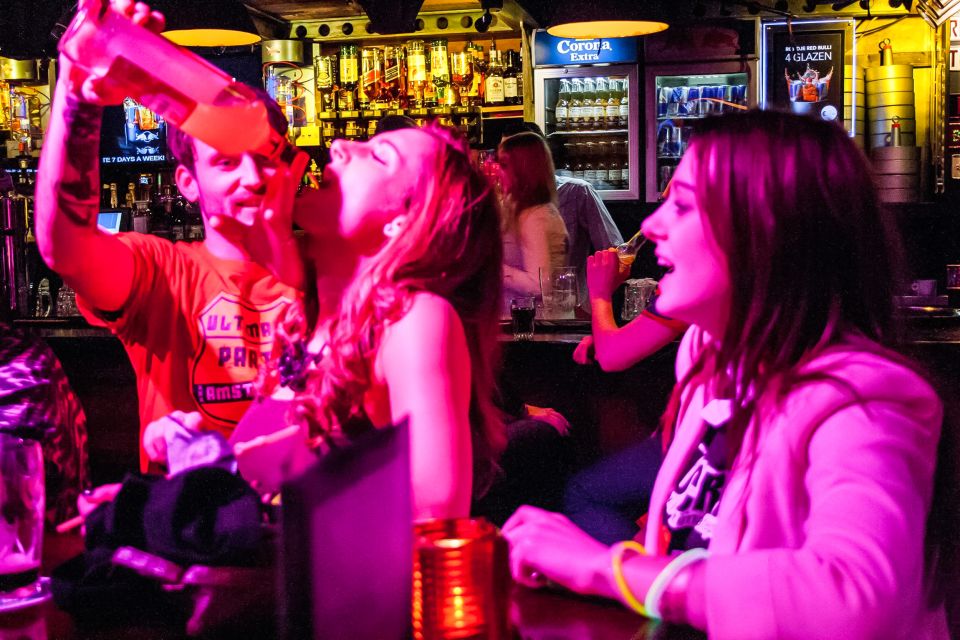 Amsterdam: Red Light District Pub Crawl with Unlimited Shots - Amsterdam’s Red Light District, but with a plan