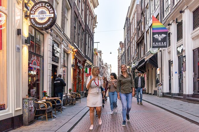 Amsterdam Red Light District Walking Tour in EN/DE/IT/ES - National Monument to Condomerie: legal, practical, and surprisingly human