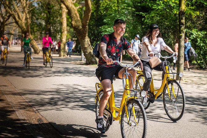 Amsterdam Small Group Bike Tour - Where you meet at Nieuwezijds Kolk 29 and what to do first