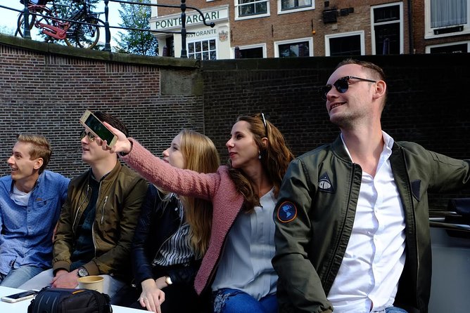 Amsterdam Small-Group Canal Cruise Including Snacks and Drinks - Jordaan, Westertoren, and Anne Frank House from the water