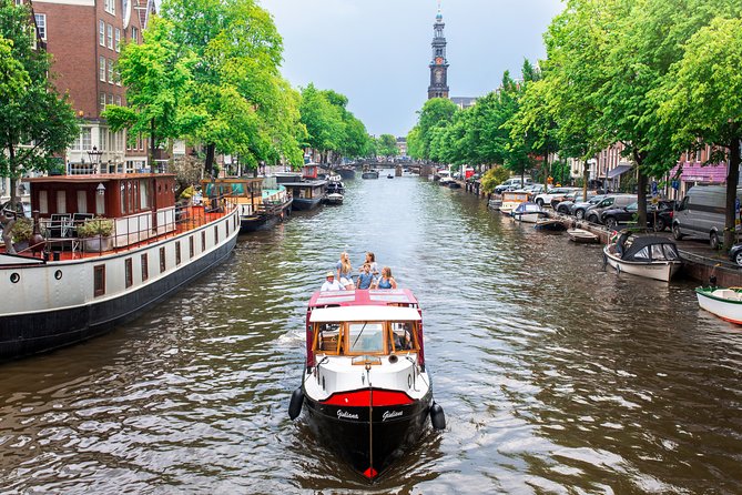 Amsterdam Small-Group Canal Cruise With Dutch Snacks and Drink - NEMO for kids, an LGBT+ monument, and Amsterdam’s oldest areas
