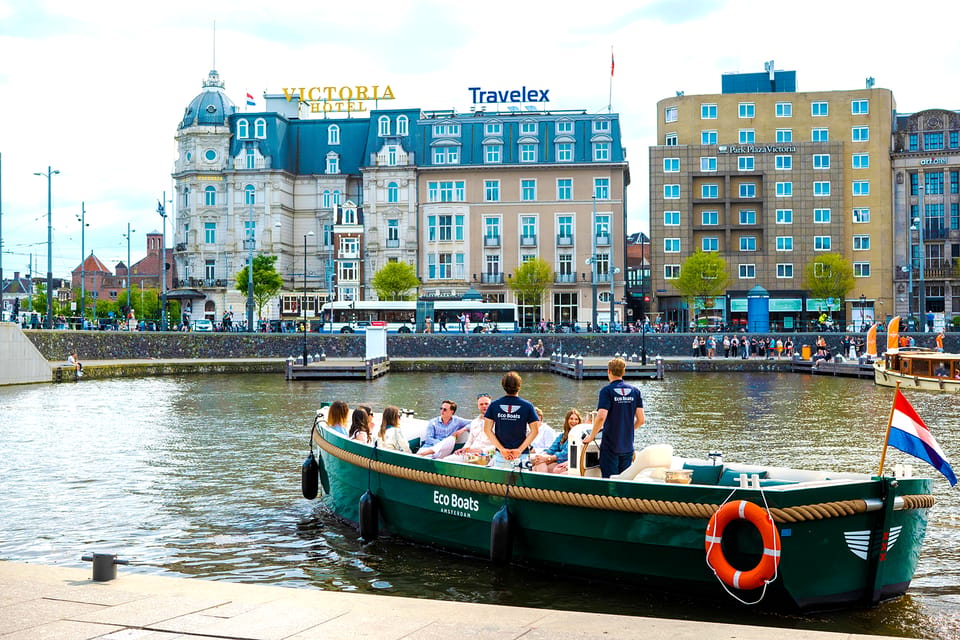 Amsterdam: The Newest Canal Cruise with Drink Option - Skinny Bridge, Canal Belt, and the best kind of storytelling
