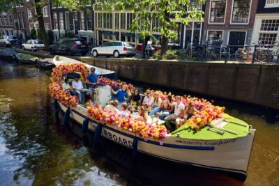 Amsterdam: The Original Flower Boat with Local Guide and Bar - Where you meet: Oudezijds Voorburgwal and finding the crew