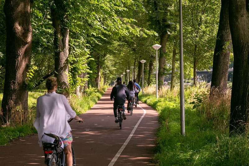 Amsterdam: Windmill, Cheese, and Countryside E-Bike Tour - Leaving Amsterdam by Ferry: Piet Heinkade 25 and the quick scene change